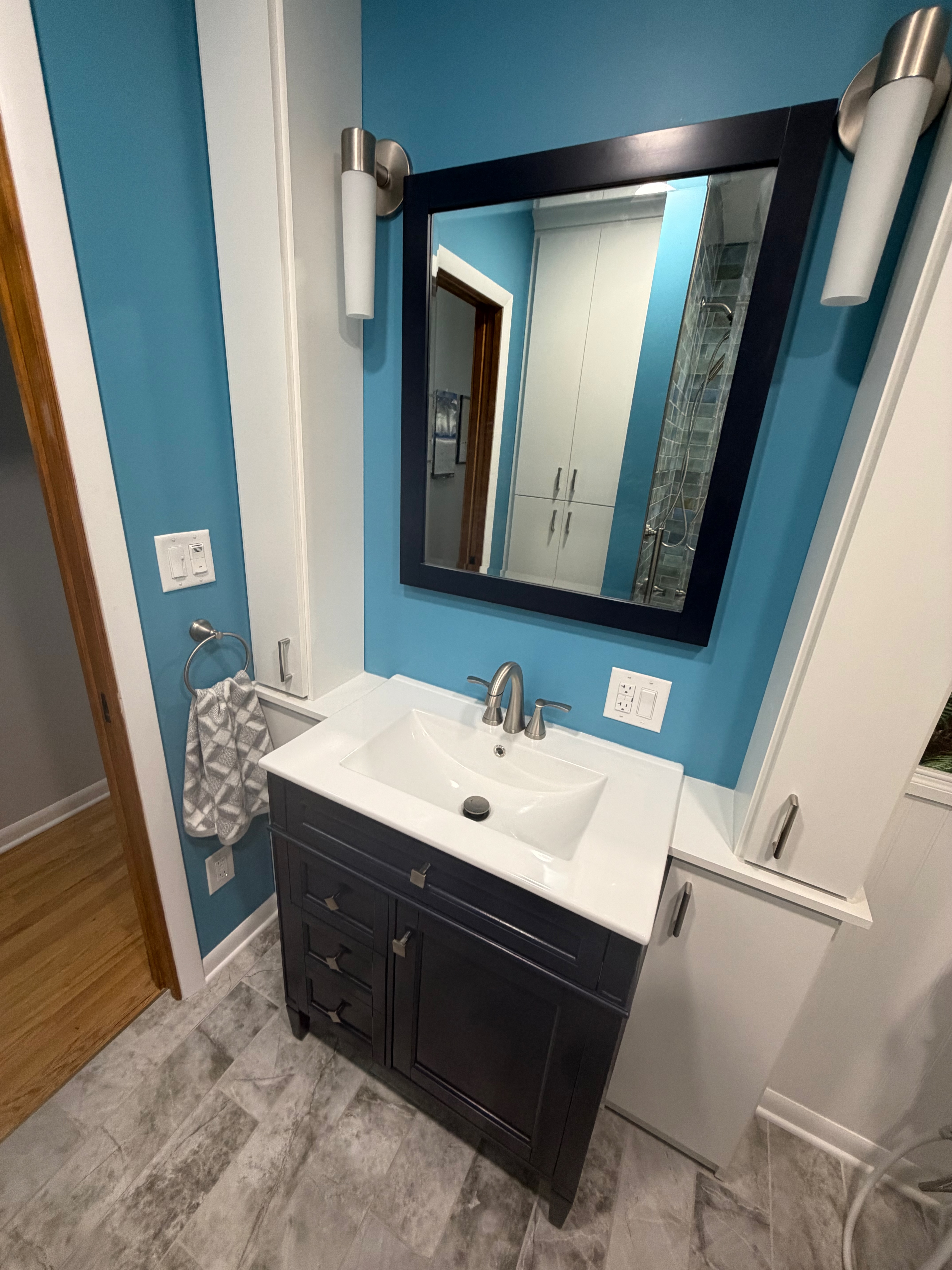 Bathroom vanity, storage and floor tile