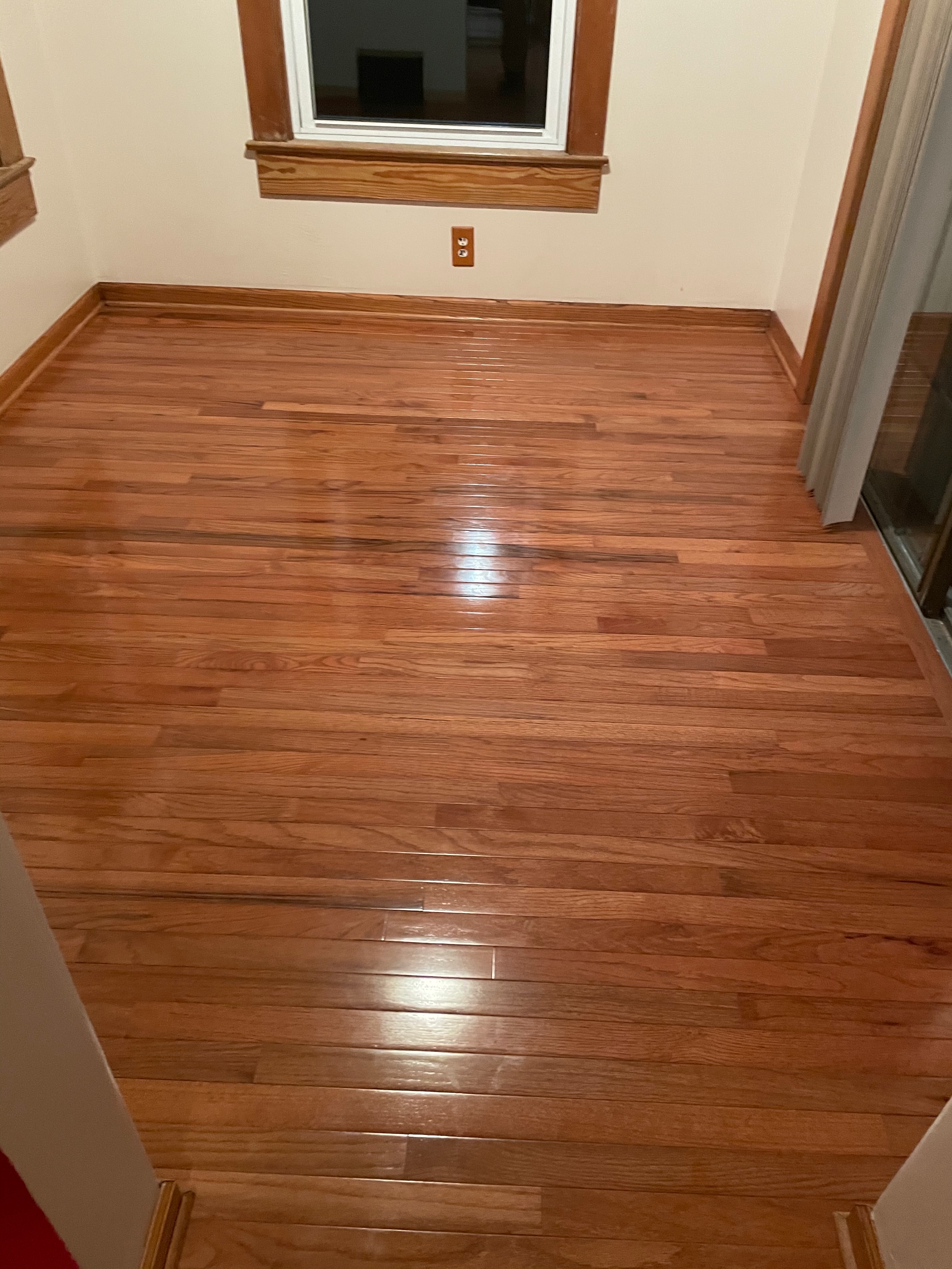 Finished hardwood flooring in a residential room