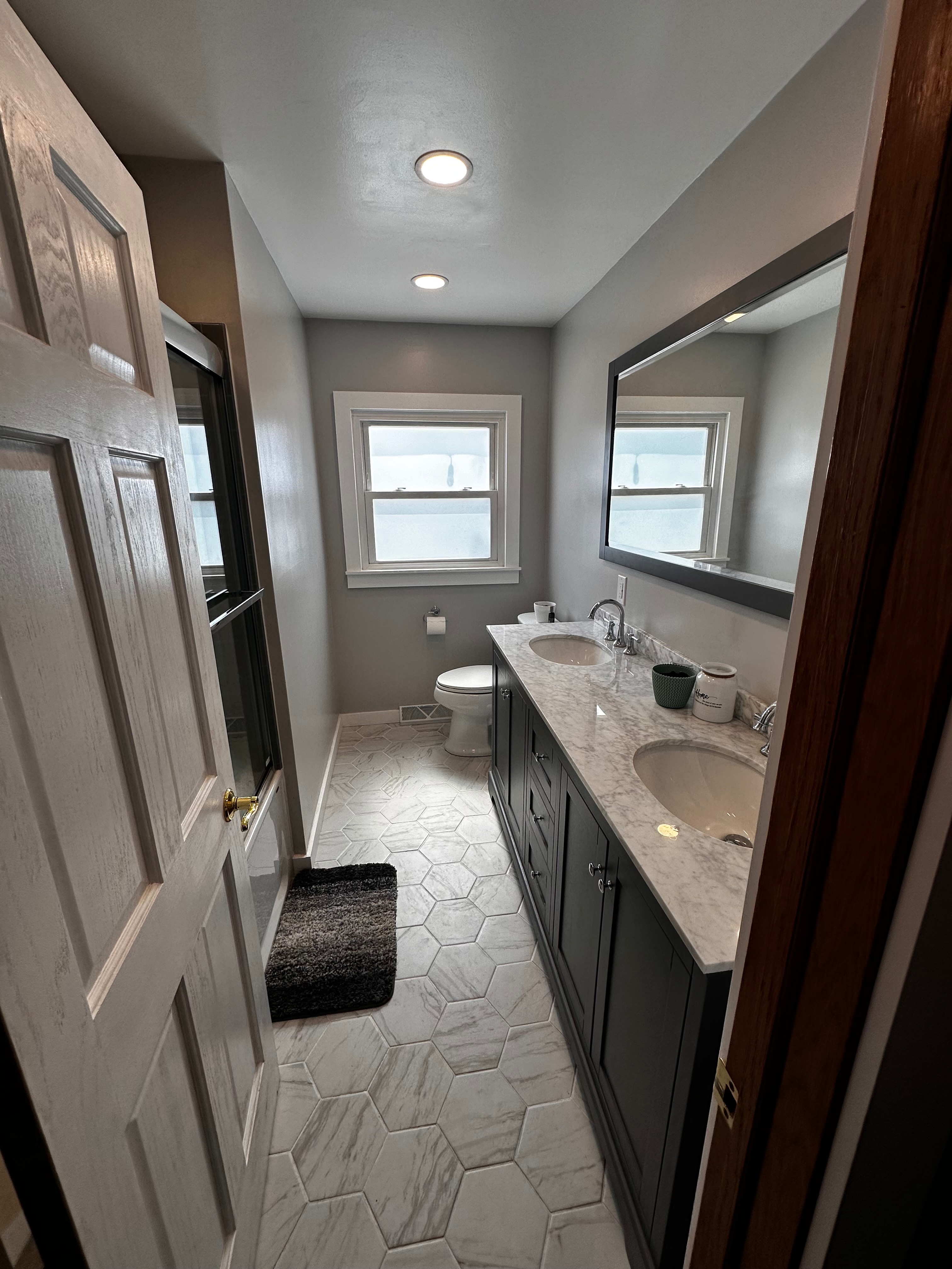 Second bath with hexagon floor tile
