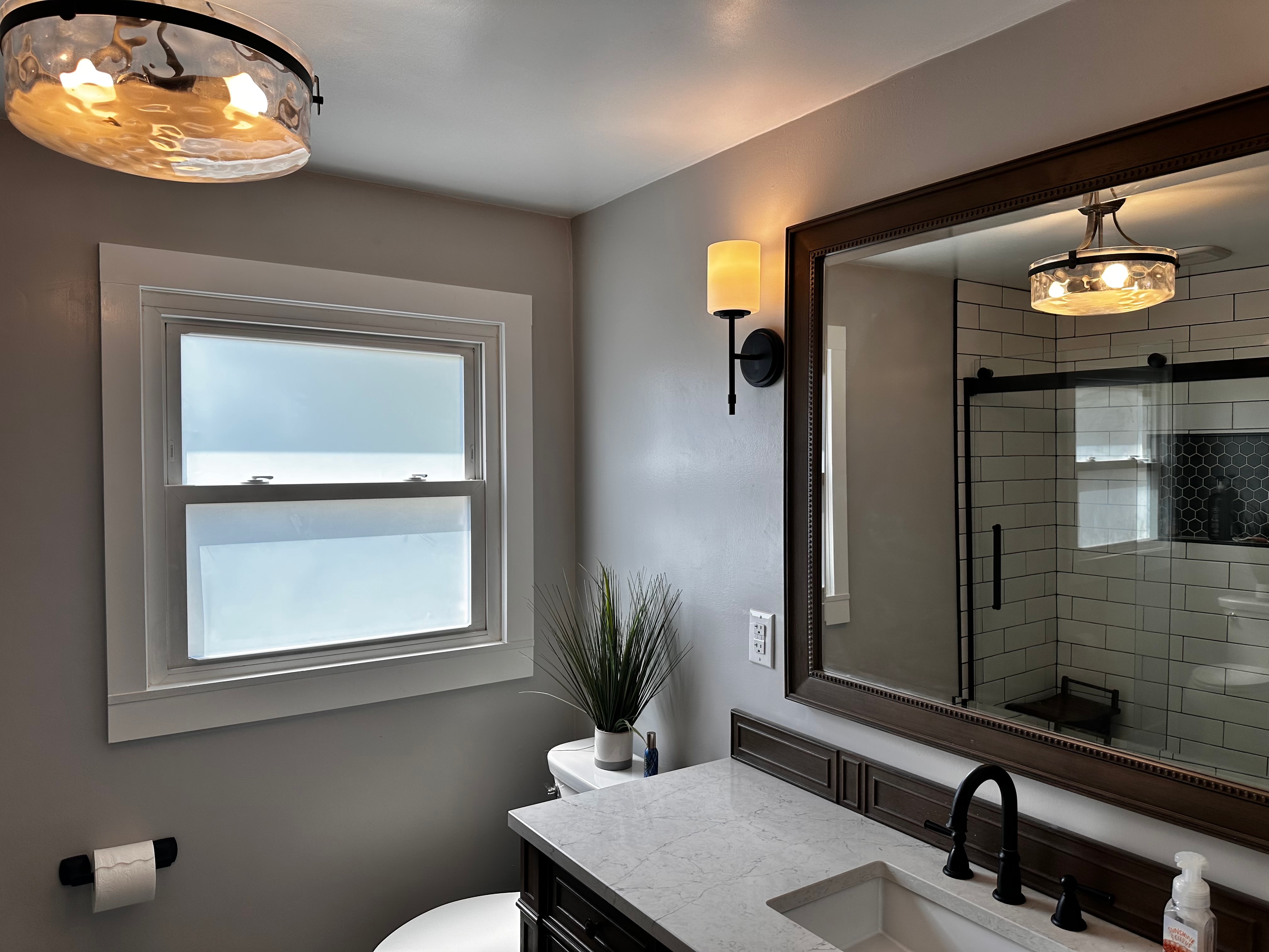 Shower tile and glass enclosure