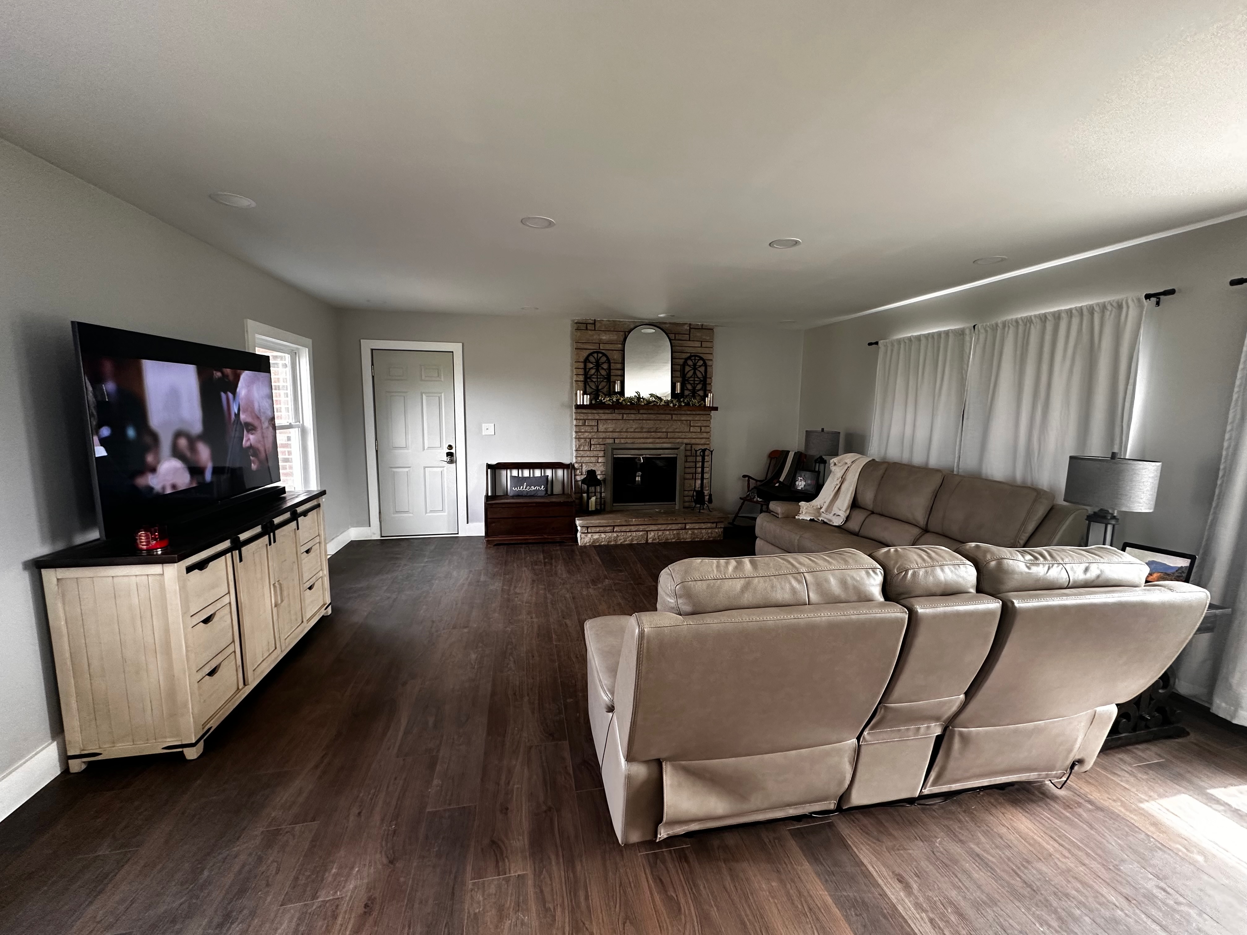 Continuous plank flooring through the living room