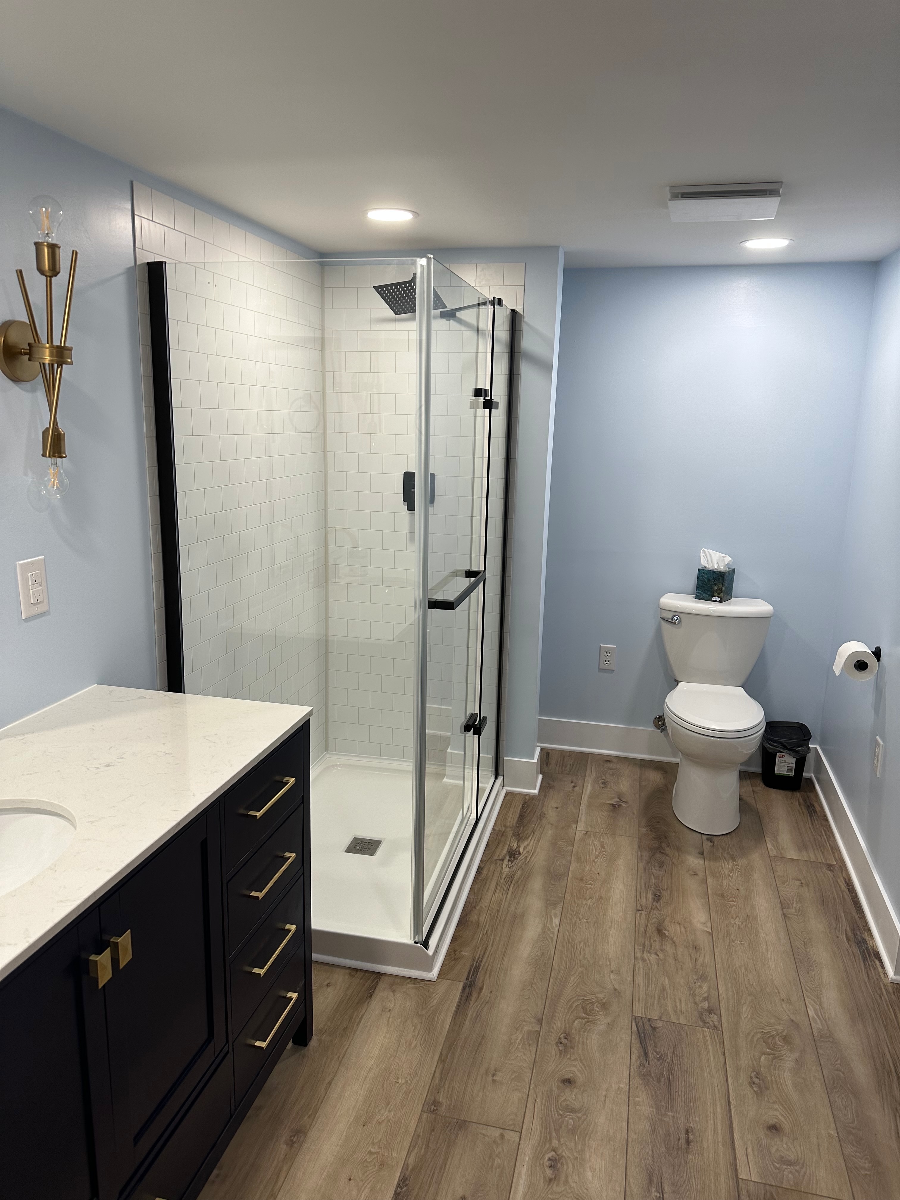 Shower and vanity from the entry — finished